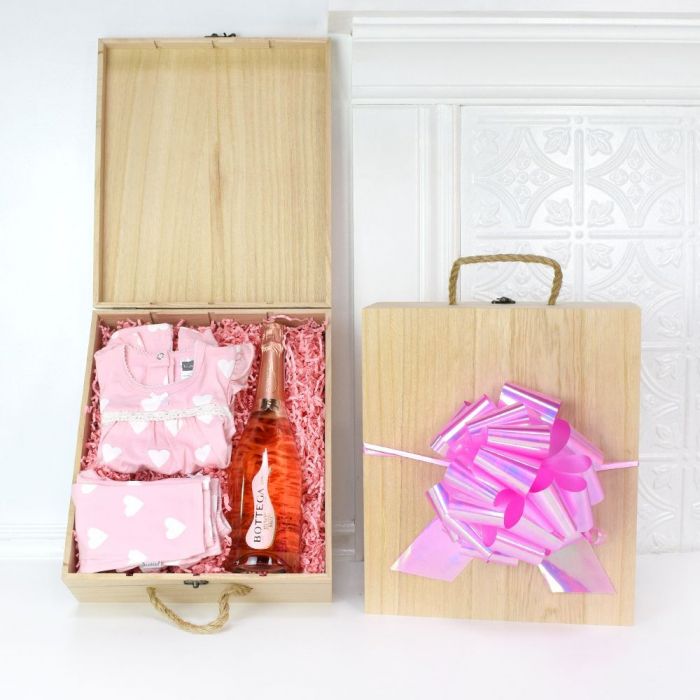 Newborn Girl Celebration Champagne Gift Box with Soft Pink Baby Apparel – how the gift is presented