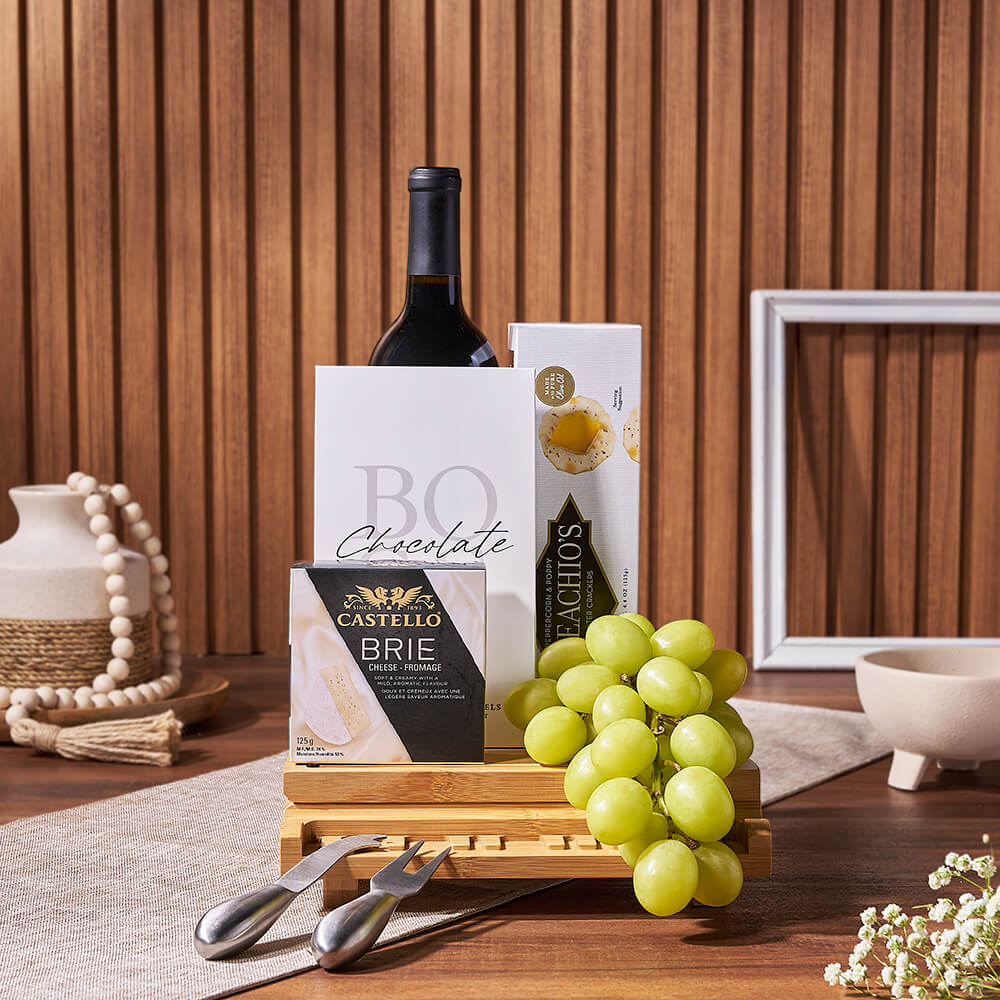Wine Gift Basket Featuring Capeachio Crackers and Castello Brie on Bamboo Board – how the gift is presented